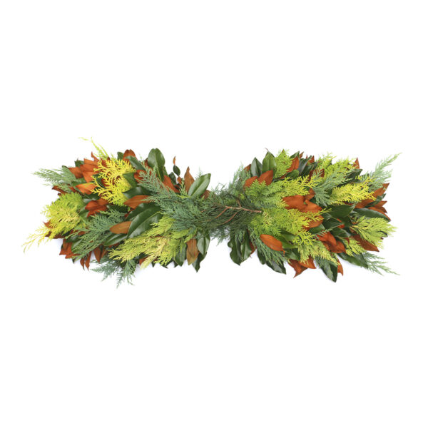 Autumn leaf garland with green, orange, and yellow foliage, perfect for fall decorations and seasona.