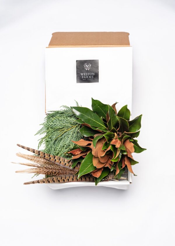 Fresh greenery and floral arrangement from Weston Farms in eco-friendly packaging.