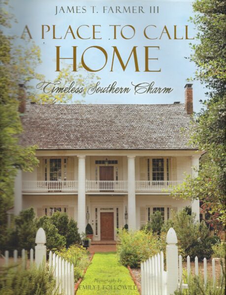 A charming Southern home with a large porch and lush garden, showcasing classic architecture and wel.