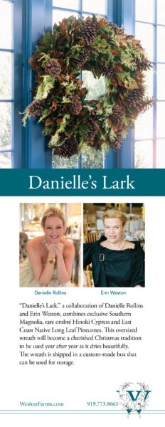 Danielle's Lark autumn wreath with pinecones and greenery on a blue door.