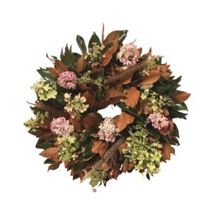 Pink and green floral wreath with brown leaves, suitable for decoration or special occasions.