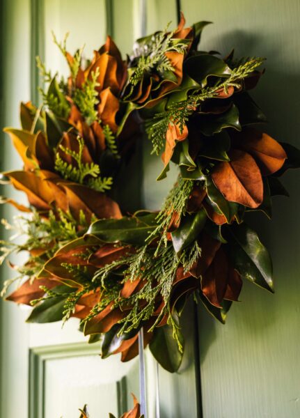 Brooke's Bank Emerald Lace 14" wreath with greenery and brown accents.